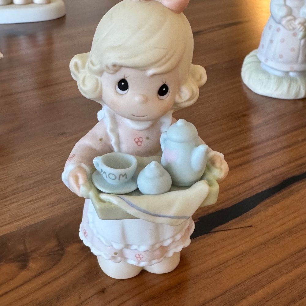 Adorable Figurine with Tea Set